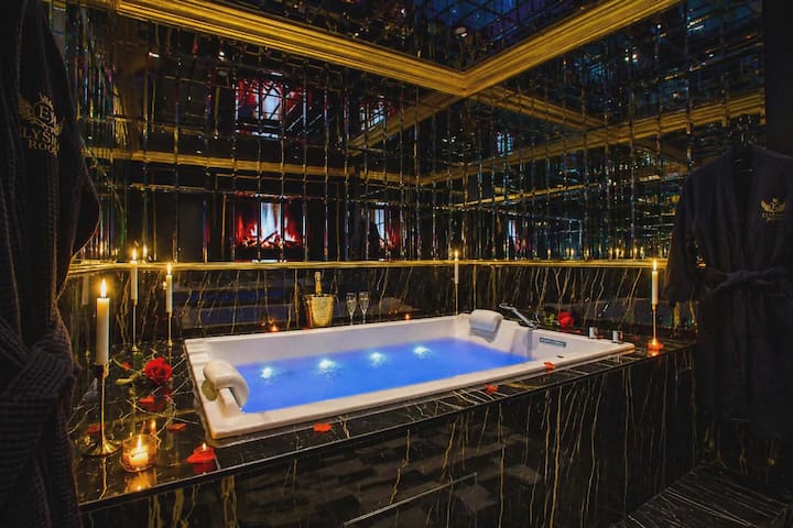 Suite de Luxe - Jacuzzi privatif - Cinéma